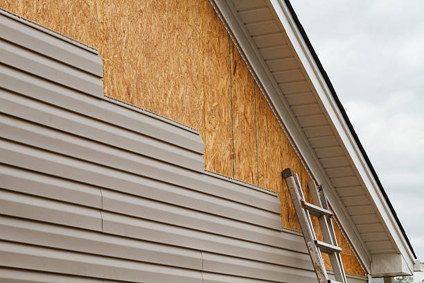 Professional Siding Contractor technician working in Howard, OH